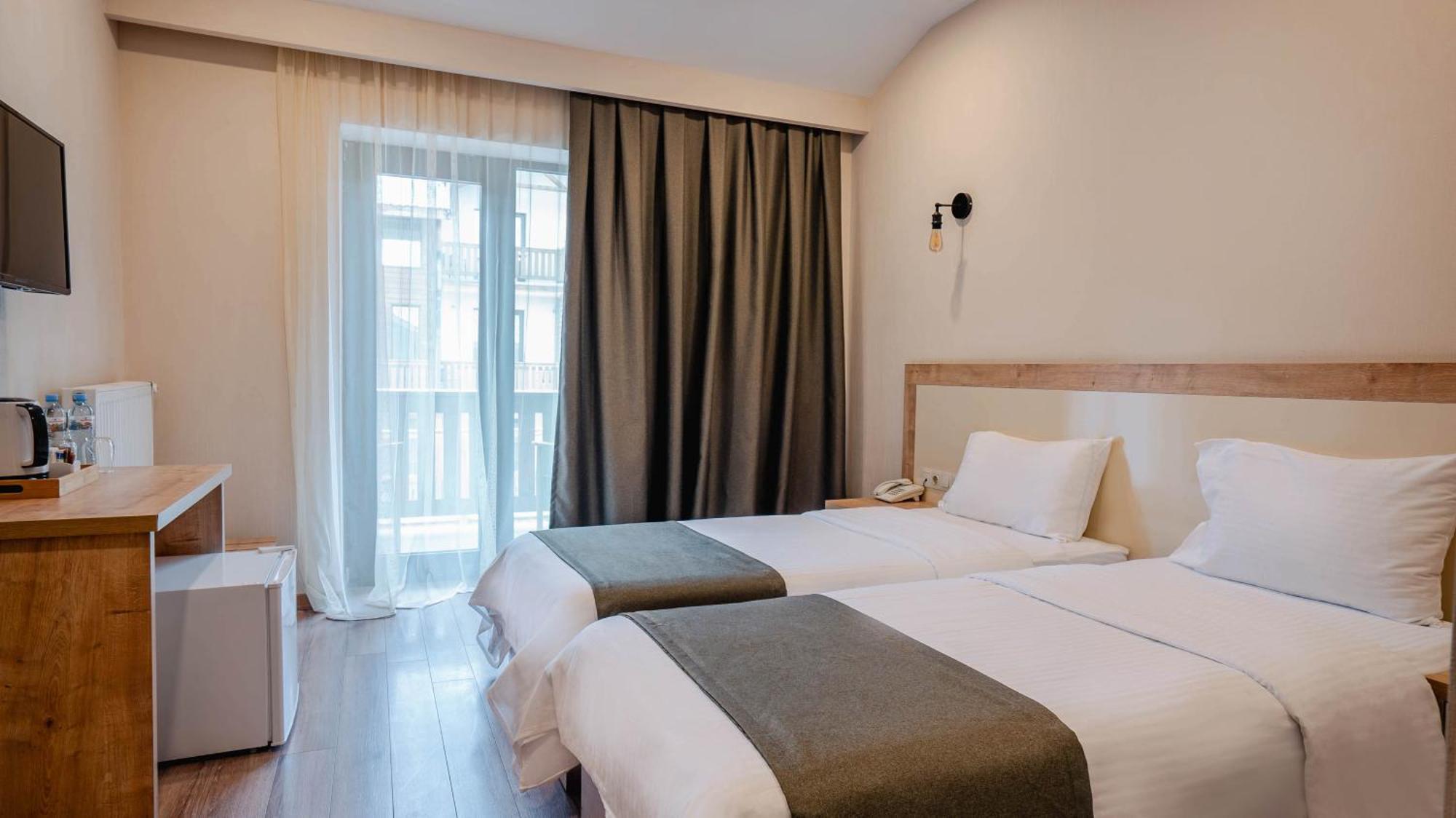 Gudauri Inn Phòng bức ảnh A room at the hotel