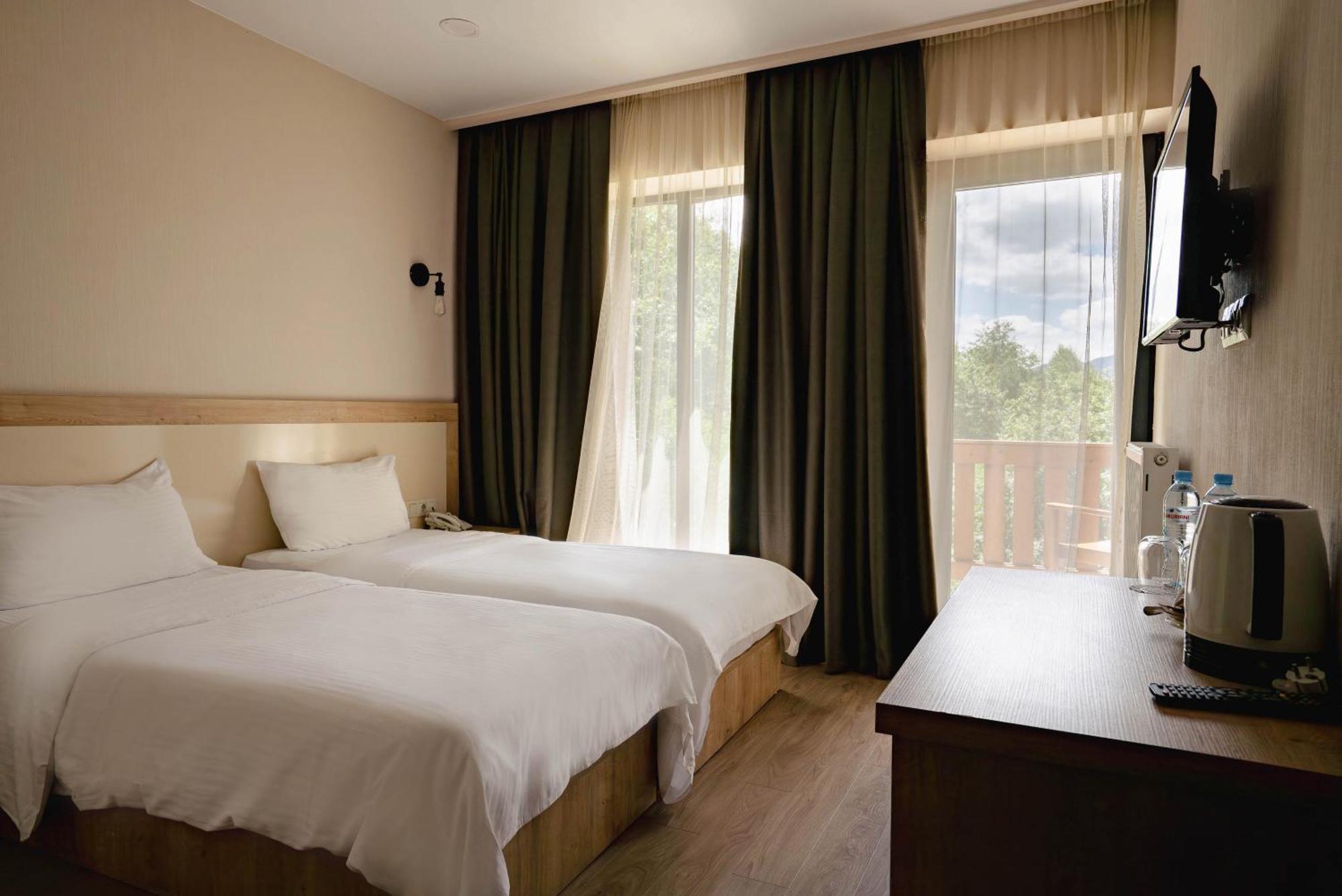 Gudauri Inn Phòng bức ảnh A room at the hotel